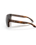 Oakley Holbrook XL Sunglasses in Matte Brown Tortoise side profile view highlighting the comfortable straight temple arm taper and iconic metallic square O brand logo icon detailing, sold by Point Break Cambridge local family surf shop at 63 Duke street.