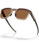 Oakley HSTN SQ 2.0 Sunglasses in Matte Rootbeer brown front view showing the progressive geometric square lifestyle frame layout modern lenses and premium contrast-enhancing Prizm Bronze lenses, sold by Point Break Cambridge local family surf shop at 63 Duke street.