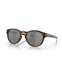 Oakley Latch Sunglasses in Matte Brown Tortoise front view showing the classic round lifestyle frame layout keyhole bridge structure and premium color-tuning Prizm Black lenses, sold by Point Break Cambridge local family surf shop at 63 Duke street.