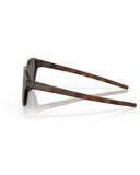 Oakley Latch Sunglasses in Matte Brown Tortoise side profile view highlighting the comfortable straight temple arm taper and iconic metallic brand logo clip detailing, sold by Point Break Cambridge local family surf shop at 63 Duke street.