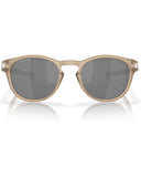 Oakley Latch Sunglasses in Sepia translucent brown front view showing the classic round lifestyle frame layout keyhole bridge structure and premium glare-reducing Prizm Black Polarized lenses, sold by Point Break Cambridge local family surf shop at 63 Duke street.