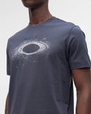 Oakley Lunar Ellipse Tee in Graphite grey close up view highlighting the premium soft performance knit fabric weave texture and detailed lunar print graphic finish, sold by Point Break Cambridge local family surf shop at 63 Duke street.