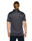 Oakley O Hydrolix Galaxy Polo in Blackout matte black back view showing the clean shoulder yoke seam lines and straight performance panel structure, sold by Point Break Cambridge local family surf shop at 63 Duke street.