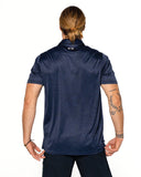 Oakley O Hydrolix Galaxy Polo in Universal Blue back view showing the clean shoulder yoke seam lines and straight performance panel structure, sold by Point Break Cambridge local family surf shop at 63 Duke street.