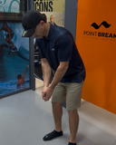 Oakley O Hydrolix Galaxy Polo in Universal Blue side profile view showing the comfortable short sleeve hem rise and regular clean stitched lower hemline, sold by Point Break Cambridge local family surf shop at 63 Duke street.
