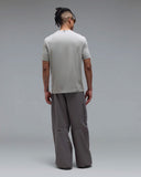 Oakley Rain Camo Tee in Cement grey back view showing the relaxed straight silhouette drape and premium structural shoulder panel seam stitching layout, sold by Point Break Cambridge local family surf shop at 63 Duke street.