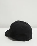 Oakley Tincan Cap in Black and Carbon Fibre back view showing the closed stretch fit panels and premium stitching, sold by Point Break Cambridge local family surf shop at 63 Duke street.