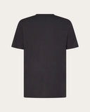 Oakley Wire B1B Tee in Blackout matte black back view showing the relaxed straight silhouette drape and premium structural shoulder panel seam stitching layout, sold by Point Break Cambridge local family surf shop at 63 Duke street.