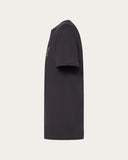 Oakley Wire B1B Tee in Blackout matte black side profile view showing the comfortable casual short sleeve length and clean flat-stitched lower hemline structure, sold by Point Break Cambridge local family surf shop at 63 Duke street.