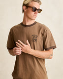 Model wearing the Rhythm Peace Sun Ringer Vintage SS T-Shirt - Oak on a plain background