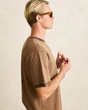 Model wearing the Rhythm Peace Sun Ringer Vintage SS T-Shirt - Oak on a plain background