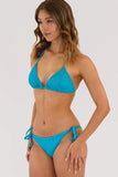 Side view of women wearing the piha gelato sliding tri biniki showing the textured fabric