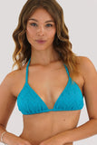 Front view of the Piha Gelato sliding triangle bikini top in Lagoon blue showing the textured geo fabric.