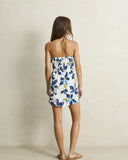 Model wearing the Rhythm Posie Mini Dress - Blue on a plain background