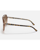 Ray-Ban Bill Sunglasses in Polished Havana On Transparent Brown side profile view highlighting the thick comfortable temple arms layered two-tone color execution and iconic classic script raised silver Ray-Ban brand logo detailing, sold by Point Break Cambridge local family surf shop at 63 Duke street.