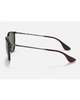 Ray-Ban Erika Classic Sunglasses in Polished Light Havana tortoiseshell side profile view highlighting the ultra thin lightweight metallic temple arms comfortable tortoiseshell ear tip sleeves and subtle laser engraved Ray-Ban script signature, sold by Point Break Cambridge local family surf shop at 63 Duke street.