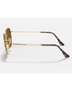 Ray-Ban Hexagonal Flat Lenses Sunglasses in Polished Arista Gold side profile view highlighting the ultra thin lightweight temple arms and subtle laser engraved classic script Ray-Ban brand signature on the lens border, sold by Point Break Cambridge local family surf shop at 63 Duke street.