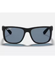 Ray-Ban Justin Classic Sunglasses in Matte Rubber Black front view showing the bold rectangular lifestyle frame layout velvety soft touch texture and premium glare-reducing Dark Blue Polarized lenses, sold by Point Break Cambridge local family surf shop at 63 Duke street.

