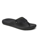 Reef Cushion Phantom 2.0 in Black flip flop sandals side profile view showing the thick high rebound cushion foam midsole and arch support contouring, sold by Point Break Cambridge local family surf shop at 63 Duke street.