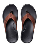 Reef Cushion Phantom 2.0 LE Jandal in Black and Brown front view showing the premium full grain leather straps and durable toe post, sold by Point Break Cambridge local family surf shop at 63 Duke street.