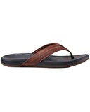 Reef Cushion Phantom 2.0 LE Jandal in Black and Brown side profile view showing the thick high rebound cushion midsole and anatomical arch support contouring, sold by Point Break Cambridge local family surf shop at 63 Duke street.