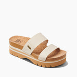 Beige sandal with cork platform on a white background
