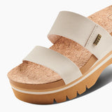 Close-up detail of the natural cork-lined footbed, anatomical arch support contouring, and chunky 2.5-inch platform heel.
