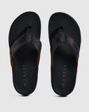 Reef Phantom Lux Jandal in Black flip flop sandals front view showing the premium full grain leather straps and soft toe post, sold by Point Break Cambridge local family surf shop at 63 Duke street.