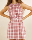 Rhythm Chelsea Check Mini Dress in Plum purple close up view highlighting the premium lightweight fabric texture, detailed plum check pattern, and subtle woven brand tag, sold by Point Break Cambridge local family surf shop at 63 Duke street.