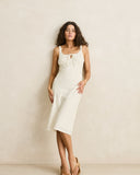 Rhythm Polka Midi Dress in Cream front view showing the elegant neckline and relaxed flowing midi silhouette in a polka dot print, sold by Point Break Cambridge local family surf shop at 63 Duke street.