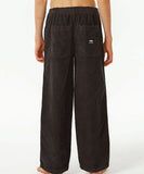 Back view of the youth Rip Curl Surf Cord Pants displaying the twin back pockets and signature woven flag label.