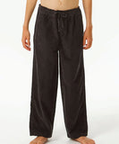Close-up detail of the 100% cotton corduroy texture and adjustable drawcord closure on the black Rip Curl boys pants.
