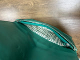 Internal open view of the green Rip Curl Plains folded wallet displaying multiple card slots and zippered compartments. showing coin compartment.