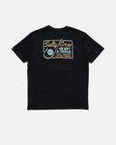 Salty Crew Mens Hooked Up Premium Short Sleeve Tee in Black back view showing the bold custom marine graphic motif screen print layout and relaxed straight lower hemline drape, sold by Point Break Cambridge local family surf shop at 63 Duke street.