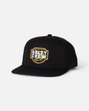 Salty Crew Red Fish Snapback Cap in Black front view showing the structured six-panel crown curved protective visor bill and clean custom red fish marine brand logo patch layout, sold by Point Break Cambridge local family surf shop at 63 Duke street.