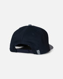 Salty Crew Tailfin Snapback Cap in Mid Blue marine tone back view highlighting the classic adjustable plastic snap closure open rear architecture and clean structural stitching panel lines, sold by Point Break Cambridge local family surf shop at 63 Duke street.