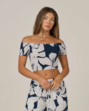 Salty Crew Womens Graphic Bloom Top in Dark Navy blue front view showing the comfortable relaxed short sleeve casual top silhouette protective clean neckline lines and vibrant floral graphic screen print, sold by Point Break Cambridge local family surf shop at 63 Duke street.