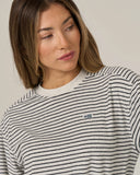 Salty Crew Womens Leeward Crew in Light Heather grey close up view highlighting the premium soft loopback knit fleece fabric weave texture durable collar ribbing and high density marine screen print finishes, sold by Point Break Cambridge local family surf shop at 63 Duke street.