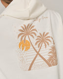 Salty Crew Womens Moon Wake Hoodie in Off White cream close up view highlighting the premium soft cotton weave vintage washed fleece texture kangaroo pocket borders and stitched brand clamp label, sold by Point Break Cambridge local family surf shop at 63 Duke street.