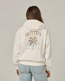 Salty Crew Womens Pretty Palm Hooded Zip in Off White cream back view showing the bold custom pretty palm tree motif graphic screen print layout and relaxed straight lower hemline drape, sold by Point Break Cambridge local family surf shop at 63 Duke street.
