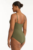 Plus Sized Woman wearing an olive green swimsuit against a white background Back view of the Sea Level Essentials Cross Multifit One Piece Swimsuit in Khaki, showing the classic back coverage and adjustable straps.