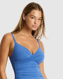 Sea Level Essentials Edit Cross Front Scoop Back One Piece swimsuit in Denim Blue close up view of the premium ribbed stretch fabric texture, sold by Point Break Cambridge local family surf shop at 63 Duke street.