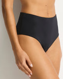 Person wearing black high-waisted bikini bottoms on a neutral background Detailed close-up macro view of the premium recycled eco fabric texture and high-stretching seamless edges on the Black Sea Level swim pants.