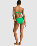 Back view of the Sea Level Sporty Mid Pant in Kelly Green highlighting the medium-to-cheeky rear coverage.