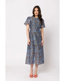 Seeking Lola Angel Dress in Choc Mistique front view showing the elegant relaxed midi length silhouette flattering tailored neckline and clean casual flowing lower chocolate pattern print hemline profile, sold by Point Break Cambridge local family surf shop at 63 Duke street.