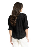 Seeking Lola Butterfly Top in Black back view showing the relaxed drape and clean premium black fabric panel, sold by Point Break Cambridge local family surf shop at 63 Duke street.