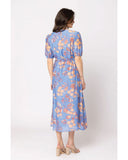 Seeking Lola Guest Dress in Sky Bouquet floral back view showing the elegant relaxed drape premium patterned fabric alignment and clean structural bodice paneled tailoring with flatlock seam stitching, sold by Point Break Cambridge local family surf shop at 63 Duke street.
