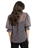 Seeking Lola Magnificent Top in Rosebud Skatter floral print blouse back view showing the premium fabric drape and shoulder alignment, sold by Point Break Cambridge local family surf shop at 63 Duke street.