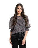 Seeking Lola Magnificent Top in Rosebud Skatter floral print blouse close up view highlighting the lightweight fabric texture and detailed rosebud pattern, sold by Point Break Cambridge local family surf shop at 63 Duke street.