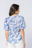 Back view of the ladies Seeking Lola Carefree blouse displaying the loose everyday drape and clean base hem.